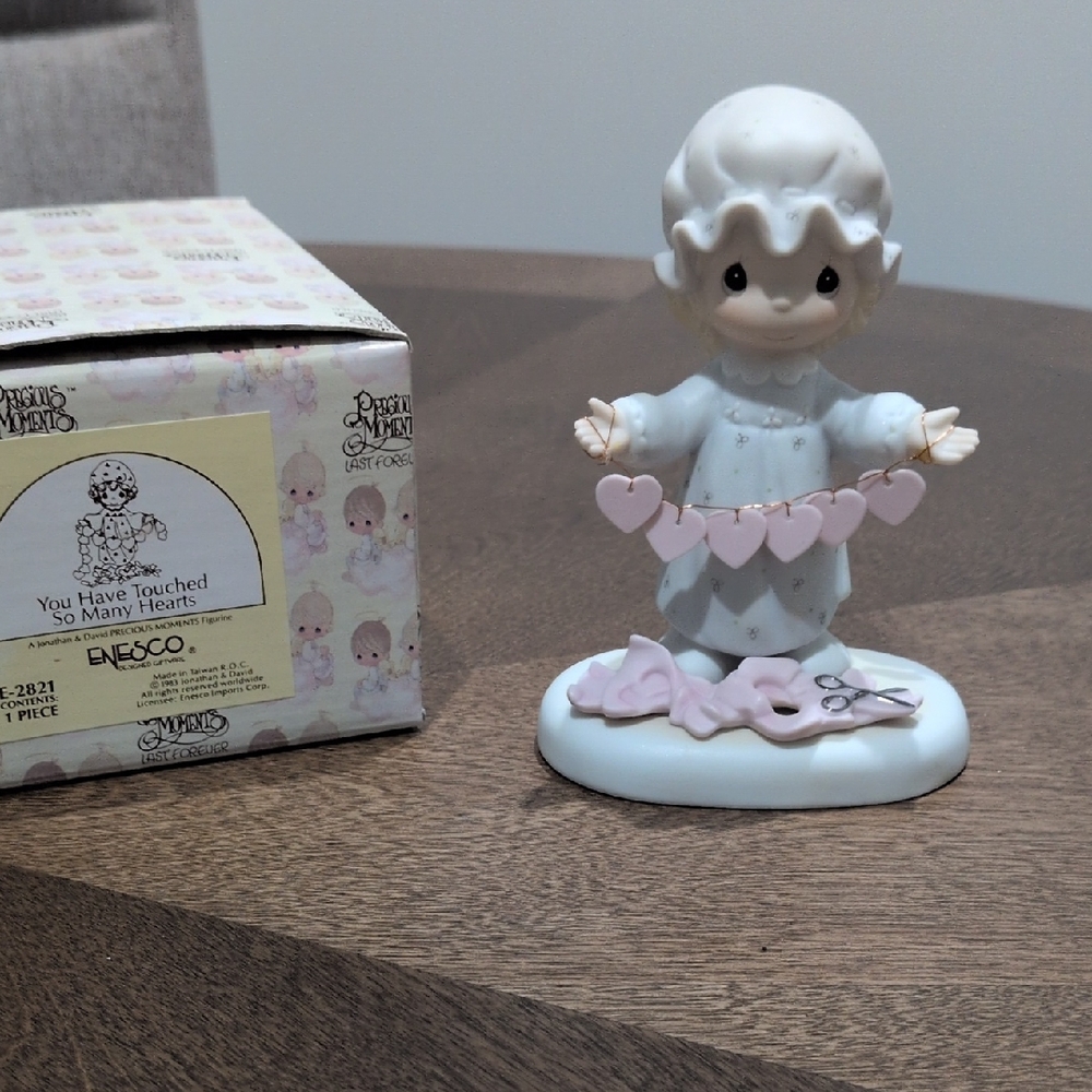 Enesco Precious Moments Figurine with Pink Accents